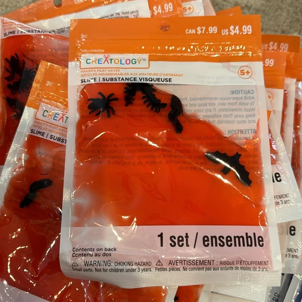 35 packets of Slime with creepy crawlers in it. 18 reddish and 17 Blue/purple.